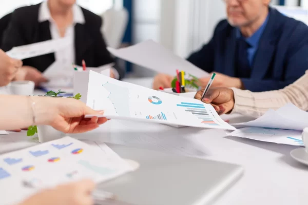 close-up-diverse-startup-company-colleagues-meeting-professional-workplace