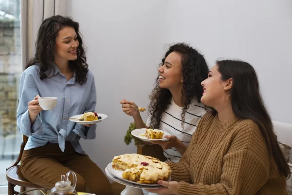 medium-shot-women-enjoying-delicious-food